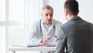 the man on reception at the doctor